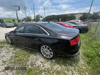 2012 Audi A8 z VIN WAURVAFD6CN015907, wystawiony jako Copart lot #59188515 z przebiegiem 112 879 mil mil oraz Czysty tytuł • Clean title. Historia ofert i sprzedaży dostępna na DreamBid. Obrazek 3.