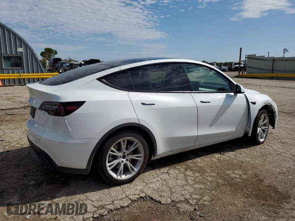2023 Tesla Model Y Long Range with VIN 7SAYGAEE6PF795434, listed as a Copart auction lot 67507984 with 24,469 mi miles and Salvage Title. Bid and sale history available at DreamBid. Image 3.