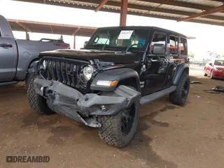 2019 Jeep Wrangler Unlimited Sport S with VIN 1C4HJXDN2KW630780, listed as a IAAI auction lot 41817573 with 56,113 mi miles. Bid and sale history available at carsss.com. Image 17.