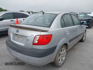 2007 Kia Rio LX with VIN KNADE123476286326, listed as a IAAI auction lot 42106275 with 183,042 mi miles. Bid and sale history available at carsss.com. Image 4.
