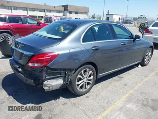 2015 Mercedes-Benz C 300 with VIN 55SWF4JB0FU056044, listed as a IAAI auction lot 42022839 with 146,295 mi miles and . Bid and sale history available at carsss.com. Image 4.
