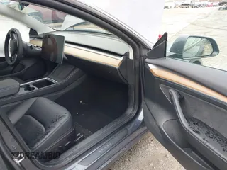 2022 Tesla Model 3 Long Range with VIN 5YJ3E1EB8NF201023, listed as a IAAI auction lot 41942943 with 30,635 mi miles and . Bid and sale history available at DreamBid. Image 5.