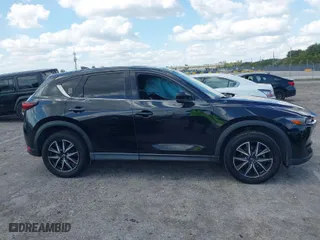 2018 Mazda CX-5 Grand Touring with VIN JM3KFBDM2J0390611, listed as a IAAI auction lot 42006482 with 97,497 mi miles. Bid and sale history available at carsss.com. Image 13.
