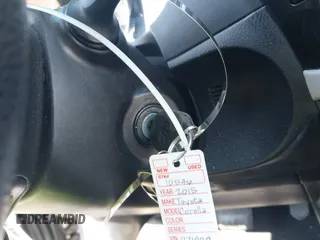 2015 Toyota Corolla L z VIN 2T1BURHE3FC271909, wystawiony jako IAAI lot #41898712 z przebiegiem 142 987 mil mil oraz . Historia ofert i sprzedaży dostępna na DreamBid. Obrazek 11.