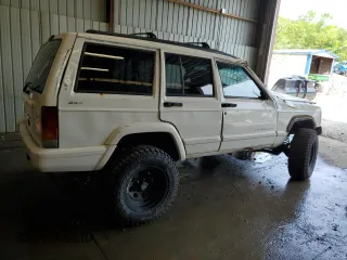1998 Jeep Cherokee Sport с VIN 1J4FJ68S7WL264740, выставлен на аукционе Copart как лот 59078465 с пробегом 147 318 миль миль и Списание • Salvage title. История ставок и продаж доступна на DreamBid. Изображение 3.