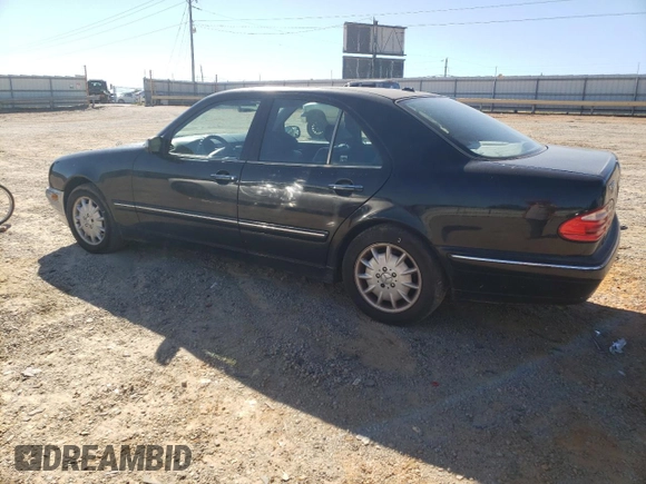 2000 Mercedes-Benz E-Class AWD with VIN WDBJF82JXYX035315, listed as a Copart auction lot 75568454 with 166,704 mi miles and Salvage Title. Bid and sale history available at carsss.com. Image 2.