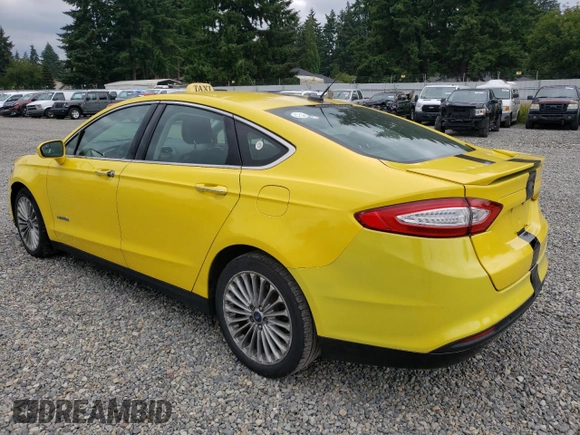 2013 Ford Fusion Titanium Hybrid with VIN 3FA6P0RU7DR326224, listed as a Copart auction lot 61597825 with 256,880 mi miles and Salvage title. Bid and sale history available at DreamBid. Image 2.