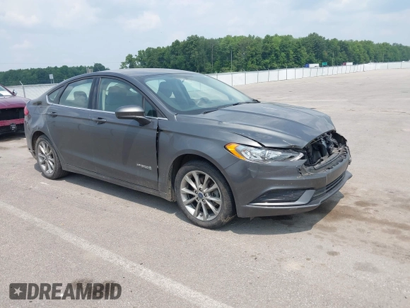 2017 Ford Fusion Hybrid SE with VIN 3FA6P0LUXHR279771, listed as a IAAI auction lot 42417831 with 189,493 mi miles and . Bid and sale history available at DreamBid. Image 1.