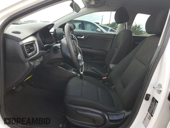 2023 Kia Rio S with VIN 3KPA24AD3PE603095, listed as a Copart auction lot 74014854 with Not Provided miles and Salvage Title. Bid and sale history available at DreamBid. Image 7.