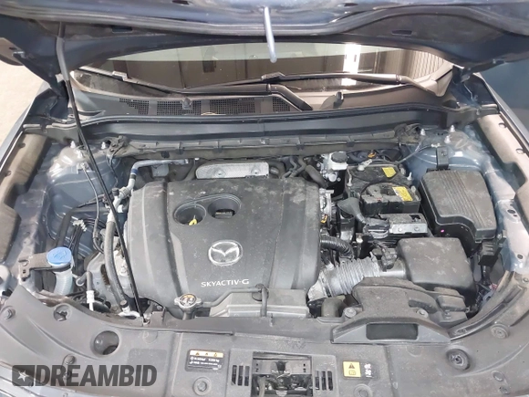 2022 Mazda CX-5 2.5 S Preferred Package with VIN JM3KFBCM7N0532765, listed as a IAAI auction lot 41576385 with 27,164 mi miles. Bid and sale history available at carsss.com. Image 10.