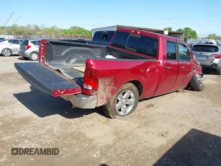 2014 Ram 1500 SLT with VIN 1C6RR6GT9ES225469, listed as a IAAI auction lot 41971290 with 204,575 mi miles. Bid and sale history available at carsss.com. Image 4.
