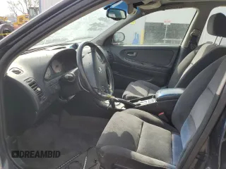 2002 Nissan Maxima GLE z VIN JN1DA31A52T301567, wystawiony jako Copart lot #51479115 z przebiegiem 122 327 mil mil oraz Szkoda całkowita • Salvage title. Historia ofert i sprzedaży dostępna na DreamBid. Obrazek 7.