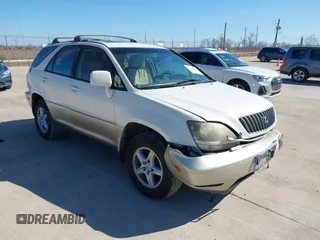 1999 Lexus RX 300 Luxury SUV with VIN JT6GF10U2X0021259, listed as a IAAI auction lot 41646612 with 236,312 mi miles. Bid and sale history available at carsss.com. Image 1.