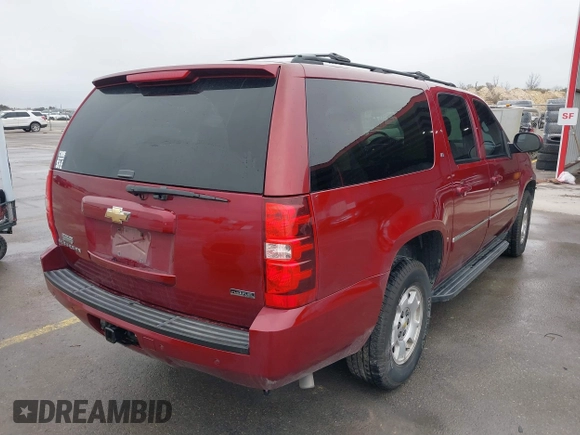 2011 Chevrolet Suburban LT with VIN 1GNSCJE07BR323241, listed as a IAAI auction lot 41548258 with 262,547 mi miles. Bid and sale history available at carsss.com. Image 4.