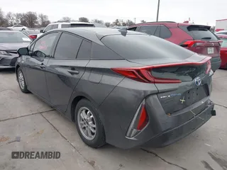 2018 Toyota Prius Plus with VIN JTDKARFPXJ3087064, listed as a IAAI auction lot 41433495 with 118,298 mi miles and . Bid and sale history available at DreamBid. Image 3.
