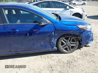 2021 Kia Forte GT-Line z VIN 3KPF34AD5ME408680, wystawiony jako IAAI lot #42442538 z przebiegiem 42 231 mil mil oraz . Historia ofert i sprzedaży dostępna na DreamBid. Obrazek 6.