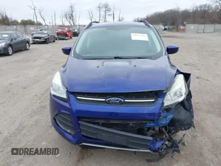 2013 Ford Escape SE z VIN 1FMCU9GX5DUD35239, wystawiony jako IAAI lot #41677245 z przebiegiem Nie podano mil oraz . Historia ofert i sprzedaży dostępna na DreamBid. Obrazek 12.