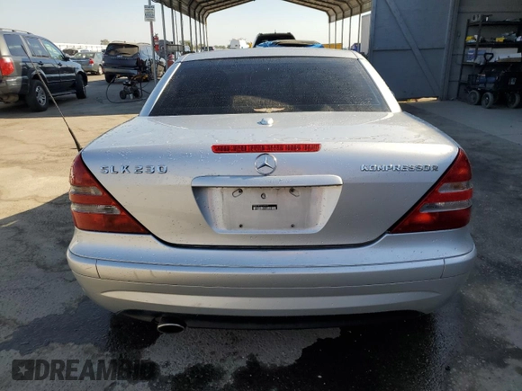2002 Mercedes-Benz SLK-Class 2.3L Kompressor with VIN WDBKK49FX2F268683, listed as a Copart auction lot 68705174 with 132,677 mi miles and Salvage Title. Bid and sale history available at carsss.com. Image 6.