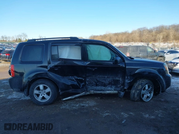 2009 Honda Pilot EX-L with VIN 5FNYF48649B026889, listed as a IAAI auction lot 41643289 with 121,511 mi miles and . Bid and sale history available at carsss.com. Image 13.