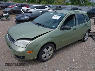 2007 Ford Focus S z VIN 1FAHP37N47W278284, wystawiony jako IAAI lot #42246383 z przebiegiem 164 830 mil mil oraz . Historia ofert i sprzedaży dostępna na DreamBid. Obrazek 18.