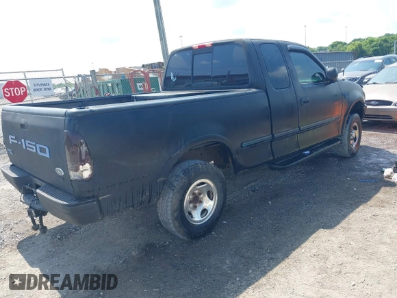 1998 Ford F-150 with VIN 1FTRX18L2WKA67414, listed as a IAAI auction lot 42583873 with 189,546 mi miles and . Bid and sale history available at DreamBid. Image 4.