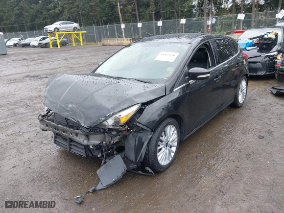 2015 Ford Focus Titanium with VIN 1FADP3N2XFL300859, listed as a IAAI auction lot 41944410 with 76,194 mi miles. Bid and sale history available at carsss.com. Image 18.