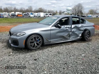 2023 BMW 5 Series M550i xDrive with VIN WBA13BK0XPCL37043, listed as a Copart auction lot 52481195 with Not provided miles and Salvage title. Bid and sale history available at DreamBid. Image 1.