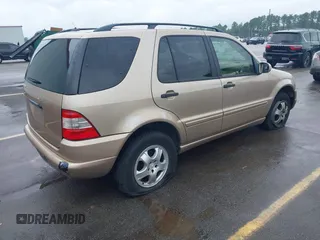 2003 Mercedes-Benz M 350 with VIN 4JGAB57E13A404190, listed as a IAAI auction lot 42434252 with 195,541 mi miles and . Bid and sale history available at DreamBid. Image 4.