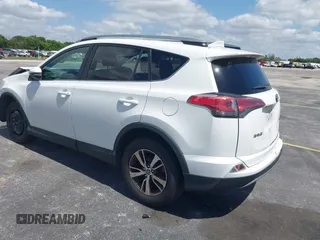 2018 Toyota RAV4 XLE with VIN 2T3WFREV9JW490324, listed as a IAAI auction lot 42298261 with 167,727 mi miles and . Bid and sale history available at DreamBid. Image 3.