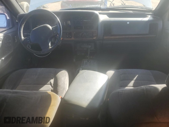 1998 Jeep Grand Cherokee Laredo with VIN 1J4GZ58S9WC361042, listed as a Copart auction lot 46802365 with 236,923 mi miles and Salvage Title. Bid and sale history available at carsss.com. Image 8.
