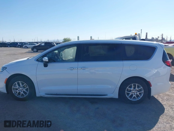 2023 Chrysler Pacifica Touring L with VIN 2C4RC1BG6PR531640, listed as a IAAI auction lot 42251680 with 31,638 mi miles and . Bid and sale history available at DreamBid. Image 14.