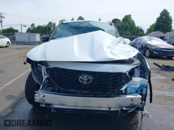 2022 Toyota Highlander XSE with VIN 5TDLZRBH2NS189006, listed as a IAAI auction lot 42298831 with 67,322 mi miles and . Bid and sale history available at DreamBid. Image 6.