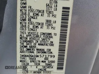2006 Nissan Titan SE с VIN 1N6BA06A16N571799, выставлен на аукционе Copart как лот 46093745 с пробегом 118 019 миль миль и Списание • Salvage title. История ставок и продаж доступна на DreamBid. Изображение 12.