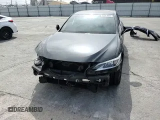 2022 Lexus ES 300h with VIN 58ADA1C17NU021831, listed as a Copart auction lot 52971935 with 73,056 mi miles and Salvage title. Bid and sale history available at DreamBid. Image 11.