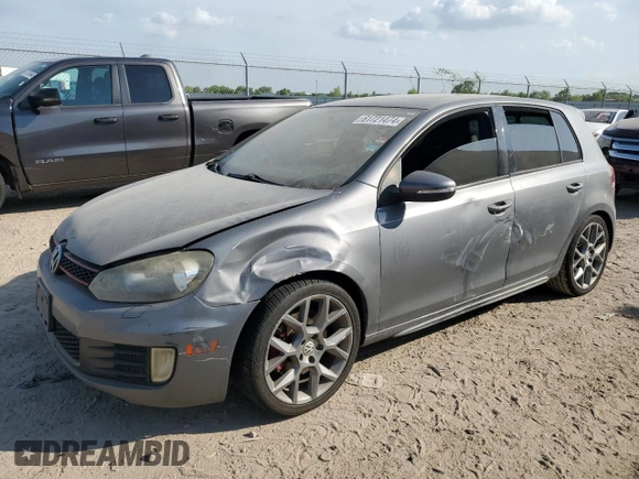 2013 Volkswagen GTI Driver's Edition with VIN WVWHD7AJXDW013669, listed as a Copart auction lot 61721474 with 210,857 mi miles and Clean title. Bid and sale history available at DreamBid. Image 1.