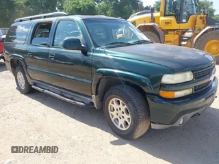 2003 Chevrolet Suburban LT z VIN 1GNFK16Z53R112476, wystawiony jako IAAI lot #42587673 z przebiegiem 360 890 mil mil oraz . Historia ofert i sprzedaży dostępna na DreamBid. Obrazek 1.