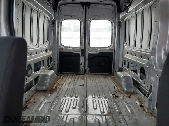 2021 Ford Transit Cargo with VIN 1FTBR2X86MKA10435, listed as a Copart auction lot 41313824 with 44,814 mi miles and . Bid and sale history available at DreamBid. Image 10.