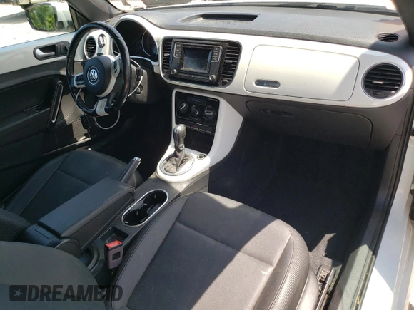 2018 Volkswagen Beetle S with VIN 3VW5DAAT7JM514853, listed as a Copart auction lot 60546195 with 62,143 mi miles and Salvage title. Bid and sale history available at DreamBid. Image 8.
