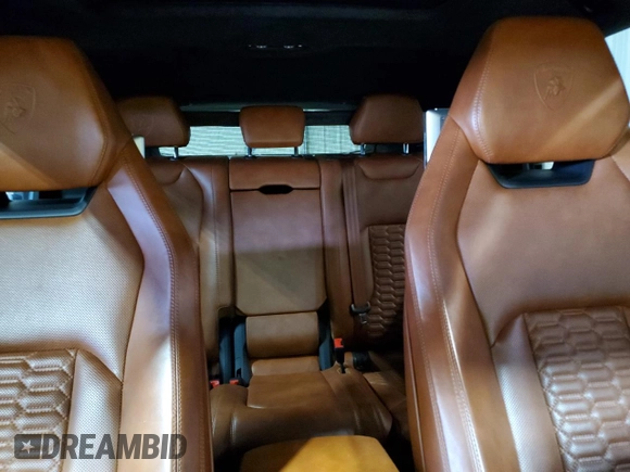 2019 Lamborghini Urus с VIN ZPBUA1ZL9KLA00879, выставлен на аукционе Copart как лот 58017485 с пробегом 23 614 миль миль и Списание • Salvage title. История ставок и продаж доступна на DreamBid. Изображение 10.
