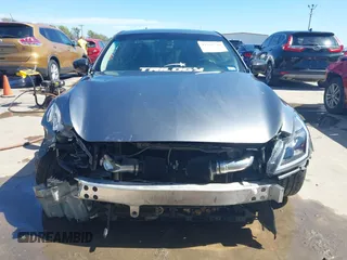 2014 Infiniti Q60 Journey z VIN JN1CV6EK1EM110800, wystawiony jako IAAI lot #41793724 z przebiegiem 134 408 mil mil oraz . Historia ofert i sprzedaży dostępna na DreamBid. Obrazek 6.