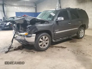 2006 GMC Yukon SLT z VIN 1GKEK13T26J107702, wystawiony jako Copart lot #59775225 z przebiegiem 252 880 mil mil oraz Szkoda całkowita • Salvage title. Historia ofert i sprzedaży dostępna na DreamBid. Obrazek 1.