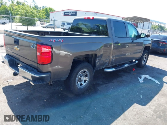 2014 Chevrolet Silverado 1500 Work Truck with VIN 3GCUKPEH0EG262607, listed as a IAAI auction lot 42028522 with 147,379 mi miles and . Bid and sale history available at DreamBid. Image 4.