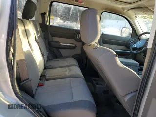 2008 Dodge Nitro SLT z VIN 1D8GU58K68W211350, wystawiony jako Copart lot #86813294 z przebiegiem Nie podano mil oraz Szkoda całkowita • Salvage title. Historia ofert i sprzedaży dostępna na DreamBid. Obrazek 10.