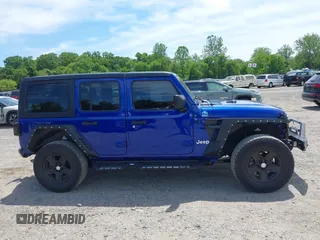 2019 Jeep Wrangler Unlimited Sport Altitude with VIN 1C4HJXDG2KW532866, listed as a IAAI auction lot 42320008 with 66,316 mi miles and . Bid and sale history available at DreamBid. Image 13.
