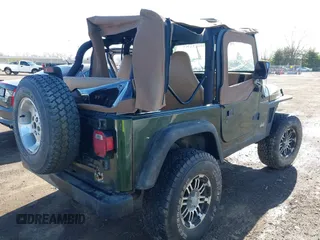 1998 Jeep Wrangler SE with VIN 1J4FY29P6WP709203, listed as a IAAI auction lot 41962877 with 1 mi miles. Bid and sale history available at carsss.com. Image 4.