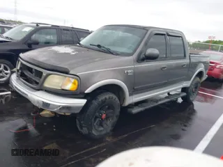 2003 Ford F-150 XLT with VIN 1FTRW08L43KD25506, listed as a IAAI auction lot 41941847 with 1 mi miles. Bid and sale history available at carsss.com. Image 2.
