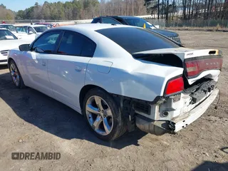 2014 Dodge Charger SXT with VIN 2C3CDXHG8EH117439, listed as a IAAI auction lot 41458304 with 189,041 mi miles and . Bid and sale history available at DreamBid. Image 3.