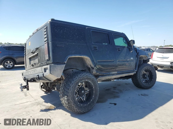 2005 Hummer H2 SUV with VIN 5GRGN23U95H101796, listed as a Copart auction lot 76991574 with 88,204 mi miles and Salvage Title. Bid and sale history available at carsss.com. Image 3.