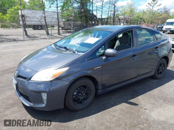 2013 Toyota Prius One with VIN JTDKN3DU2D1695784, listed as a IAAI auction lot 42212612 with 138,993 mi miles and . Bid and sale history available at DreamBid. Image 2.