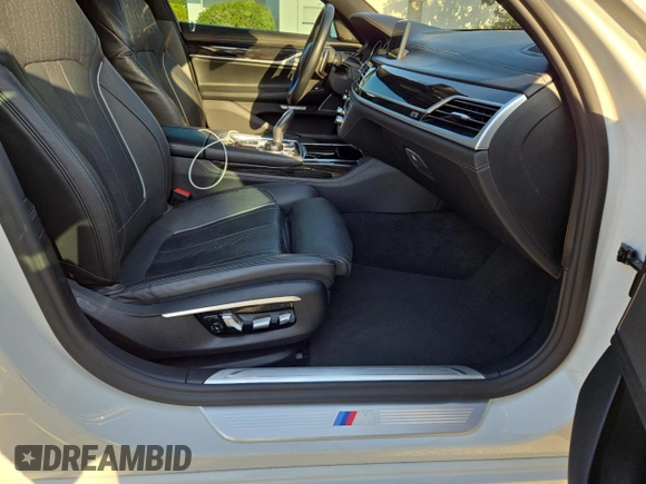 2017 BMW 7 Series 740i with VIN WBA7E2C54HG740427, listed as a Copart auction lot 54992345 with 93,252 mi miles and Clean Title. Bid and sale history available at carsss.com. Image 5.